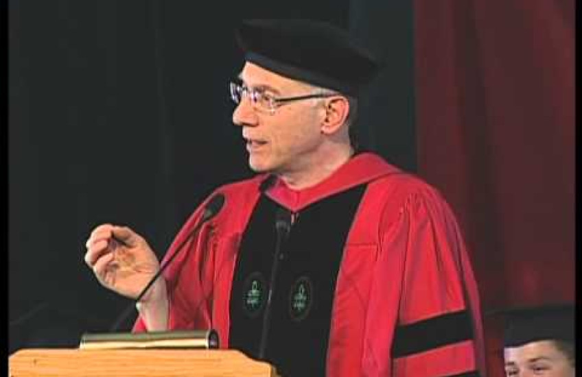  Harvey Fineberg stands at a podium