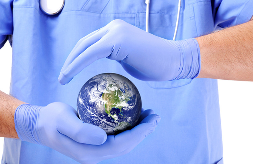 surgeon holding the globe