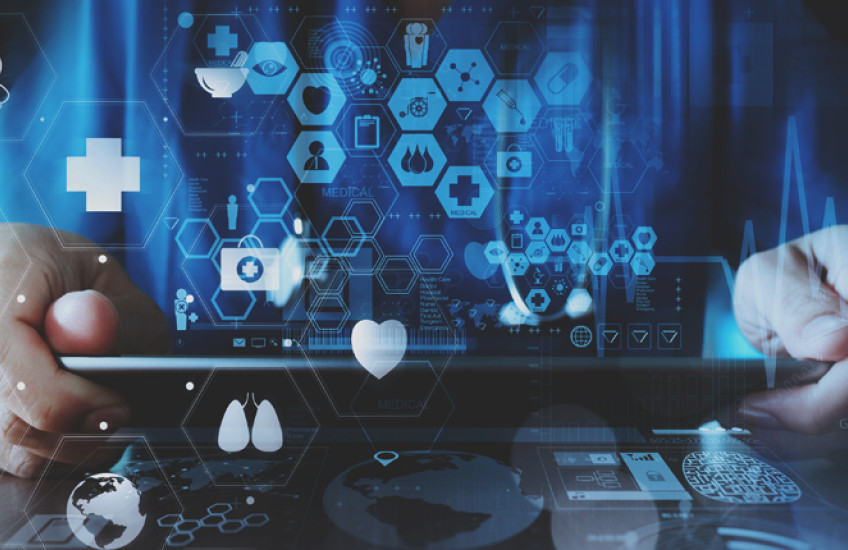 Doctor with abstract graphics representing information