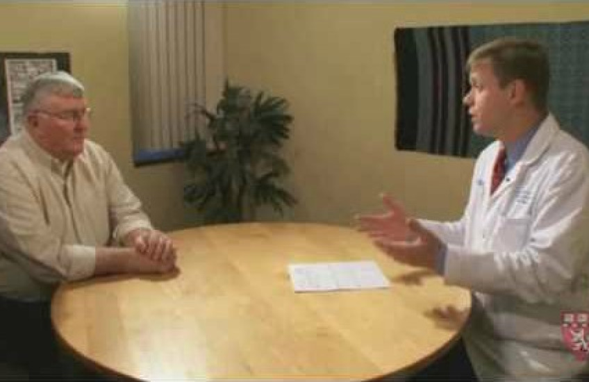 A doctor talks to a patient