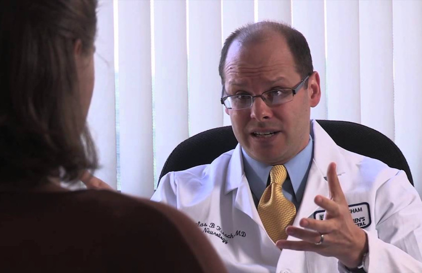 A doctor talks to a patient