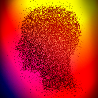 Silhouette of a human head made of particles.