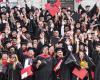 Graduates gathered for a celebratory photo after receiving their diplomas