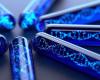 Illustration of a group of test tubes with DNA strands inside them