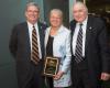 Richard Levin, Nancy Oriol and Ronald Arky displaying the Hurwitz award plaque. 