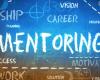 Illustration that says "Mentoring" on a chalk board 
