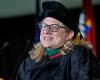Closeup of Brendel in regalia at podium