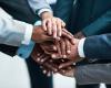 people bring their hands together