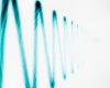 photo of side of man's head showing sound wave near ear