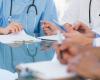 Generic photo of health care workers holding clipboards 