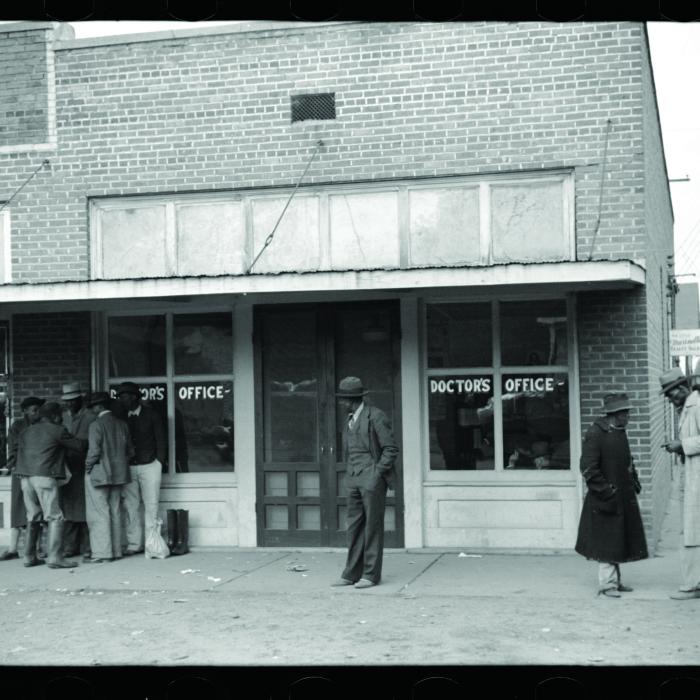 Titled “Negroes in front of doctor’s office in Merigold, Mississippi,” this photo was taken in late 1939 by Marion Post Wolcott, a noted U.S. photographer who worked for the Farm Security Administration during the Depression.