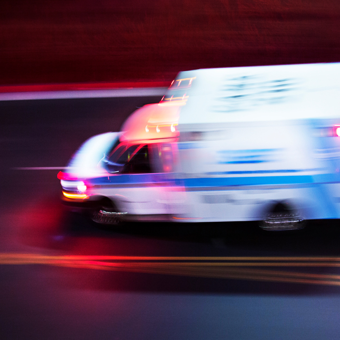 ambulance speeding along a road