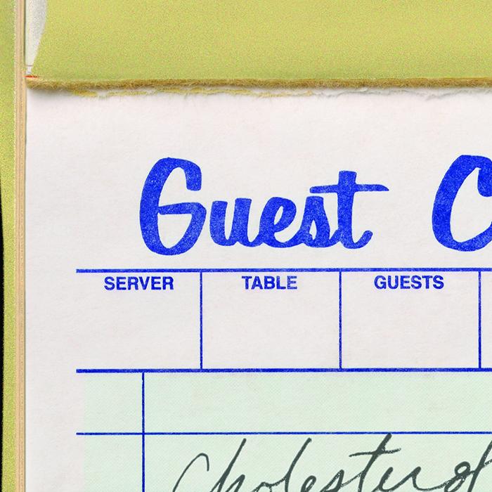 section of a pad used to take food orders in a restaurant, showing word "guest"