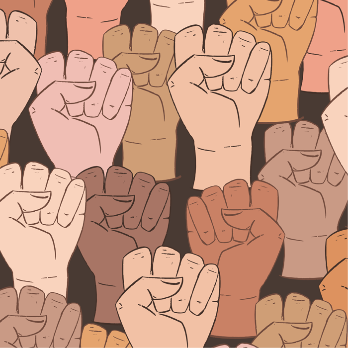 collection of ethnically diverse raised fists