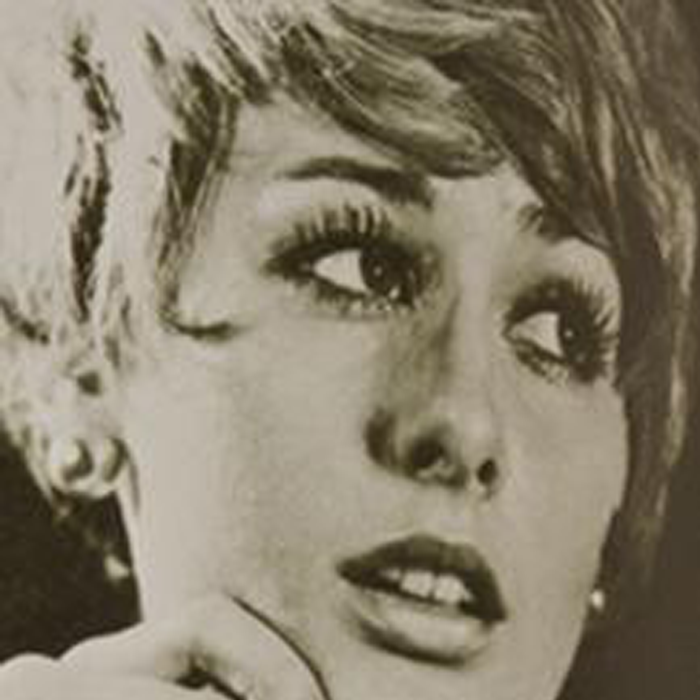 Sepia image of a woman in the 60s