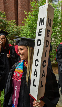 The Class of 2022 gathered outside Harvard Yard before commencement ceremonies.  Image: Steve Lipofsky