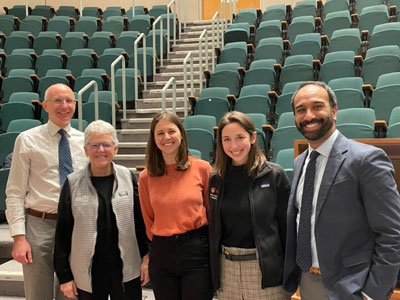 HMS students Malits and Kline with Basu, far right, in an Essentials I course in Jan. 2023 with, second from left, Gina McCarthy, White House national climate advisor (2021-2021) and Administrator for the EPA (2013-2017), and Dr. Aaron Bernstein, far left, member of the HMS Climate Health Faculty working group. 